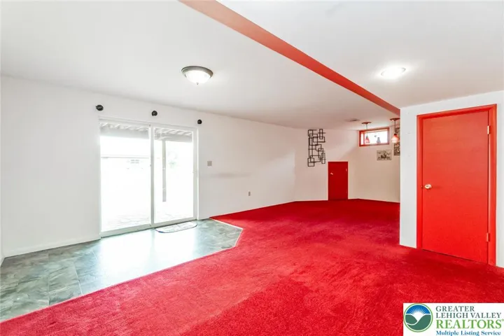 L-shaped walk-out basement family room