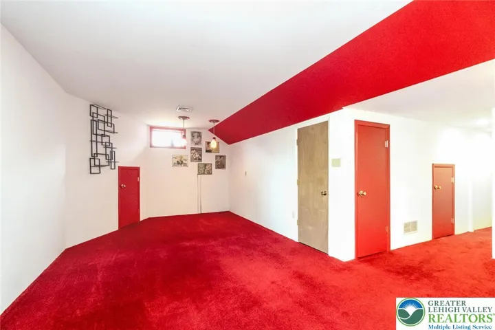 L-shaped walk-out basement family room