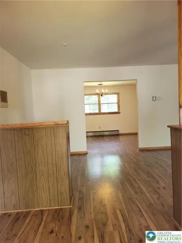 Foyer looking through living room to dinning room