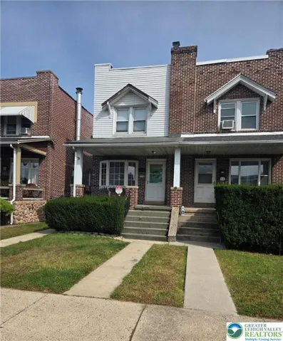 1113 S  Howard St 2 story solid brick twin