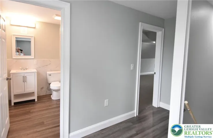 At top of stairs, 2nd full bathrm on right...