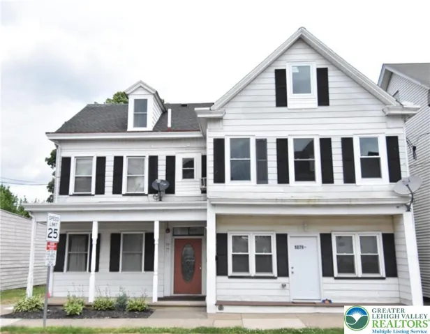 Enter through red door in center of pic...