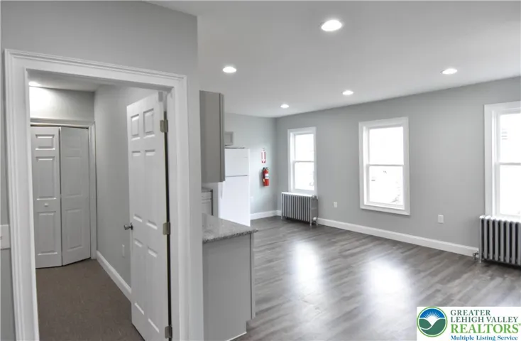 Walking toward kitchen is Bedrm1 door on the left...