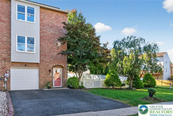 End unit with double wide driveway
