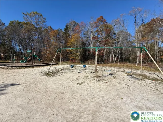 Swingset area at Locust Lake Village Community Lake