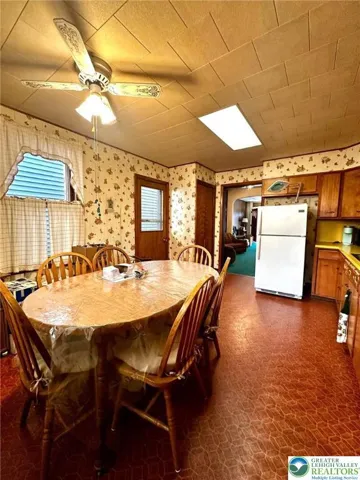 Eat-in kitchen with access to the rear outdoor space
