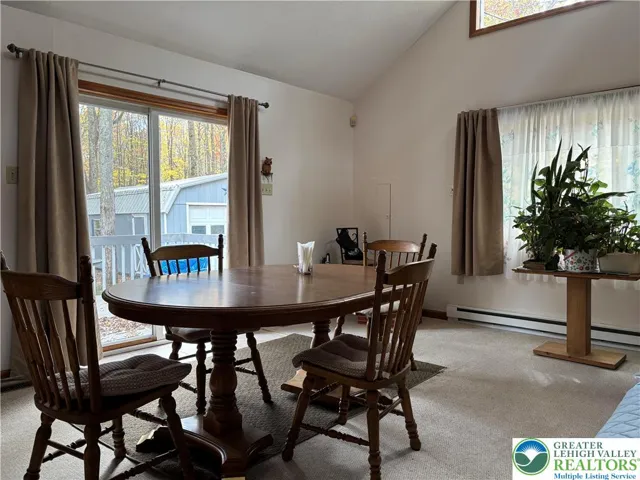 dining room area with access to deck