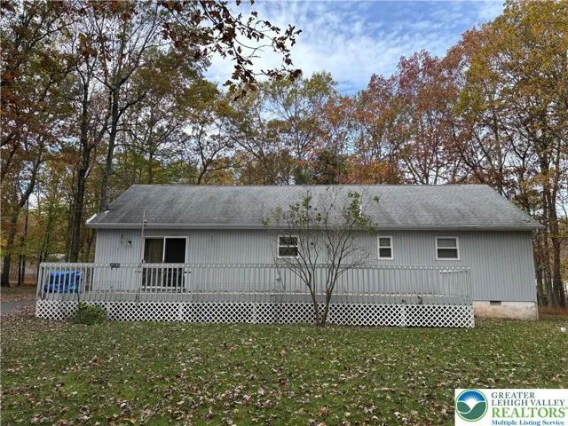 back of the house with deck