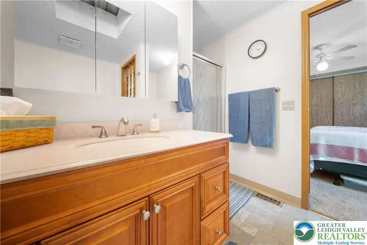 Spacious Vanity & Walk In Shower in Primary Bath
