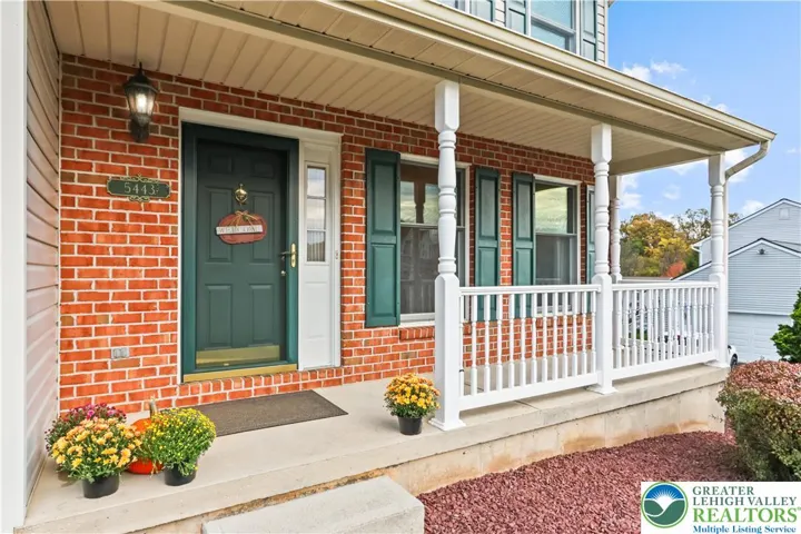 Brick Accents make the Covered Porch Entry so welcoming