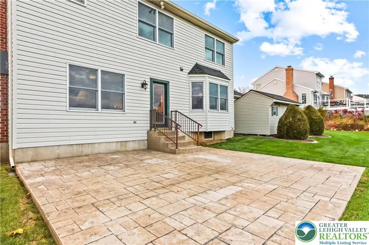 Step out of the Family Room onto a Stamped Concrete Patio