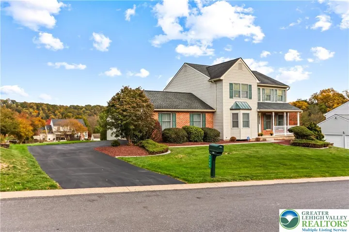 A Pristine Setting w/ neatly manicured landscaping