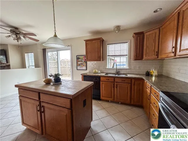 Plenty of space for a breakfast nook.  Bird watching on the deck?