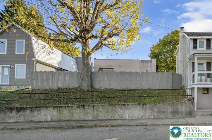 Approx. 2,688 SF Lot; 48' of frontage x 56' of depth. The adjacent home to the right is for sale also.