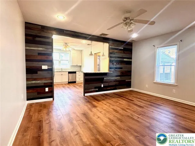living room with wooden accent wall