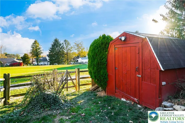 shed looking to golf course