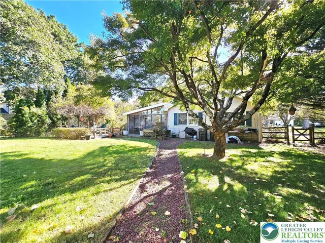 Rear walkway to garage/rear yard