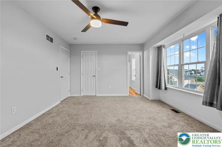 Behind doors 1 & 2: Walk-in Closet and Primary Bathroom