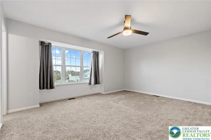 Primary Bedroom, with ceiling fan