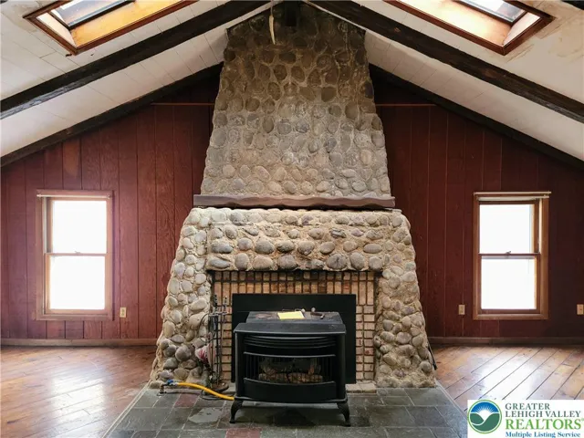 Hand laid river rock fireplace