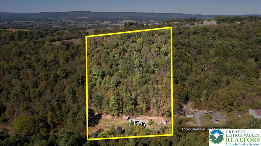 Lot #1 - 12.6 acres w/home, pond & stream