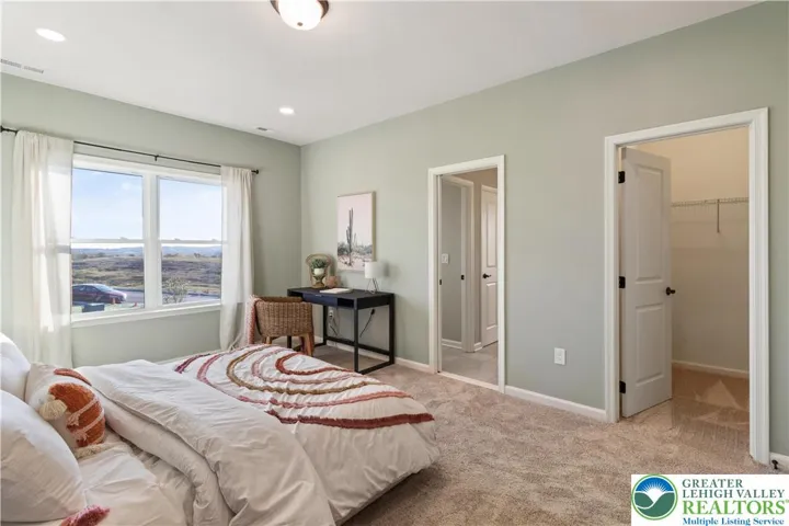 Bedroom *Photos are of a previously built model home. Features, finishes, and options may vary*
