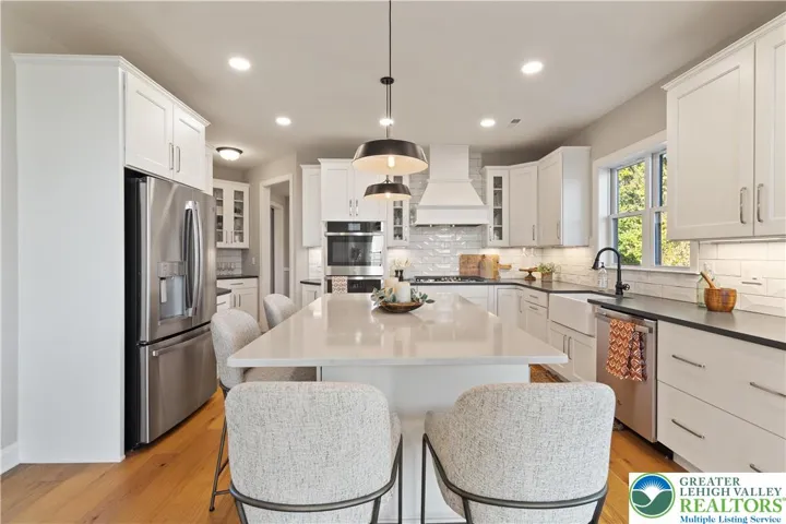 Kitchen *Photos are of a previously built model home. Features, finishes, and options may vary*