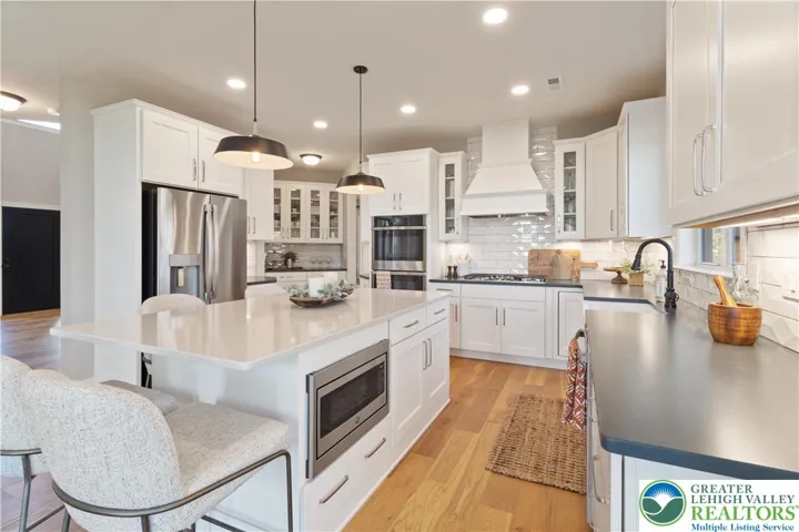Kitchen *Photos are of a previously built model home. Features, finishes, and options may vary*
