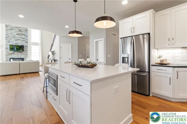 Kitchen *Photos are of a previously built model home. Features, finishes, and options may vary*