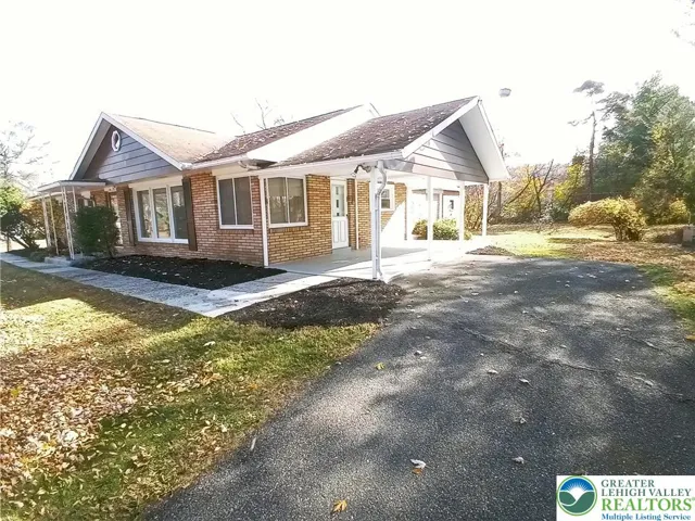 Driveway on right side of home