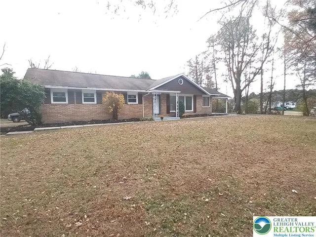 Front of home with many new windows