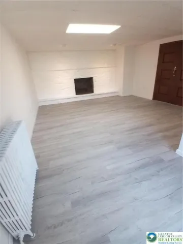 Large expansive family room with fireplace