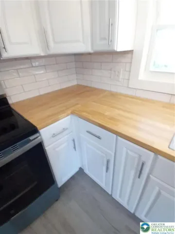 Custom butcher block countertops in kitchen