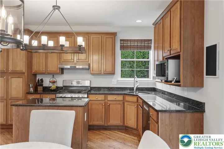 The Kitchen has SS appliances, center island