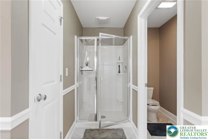 Separate shower and toilet room.