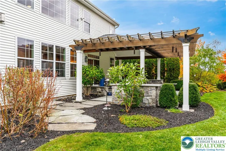 Very pretty pergola added to the covered patio