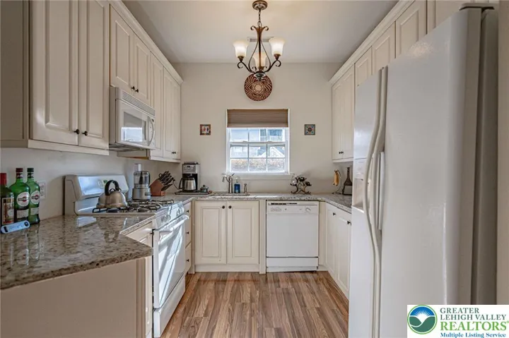 Kitchen w/ granite counter tops