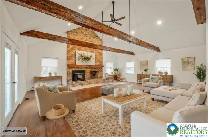 Family Room, Vaulted Ceilings, Large Brick Fireplace, Hardwood Floors