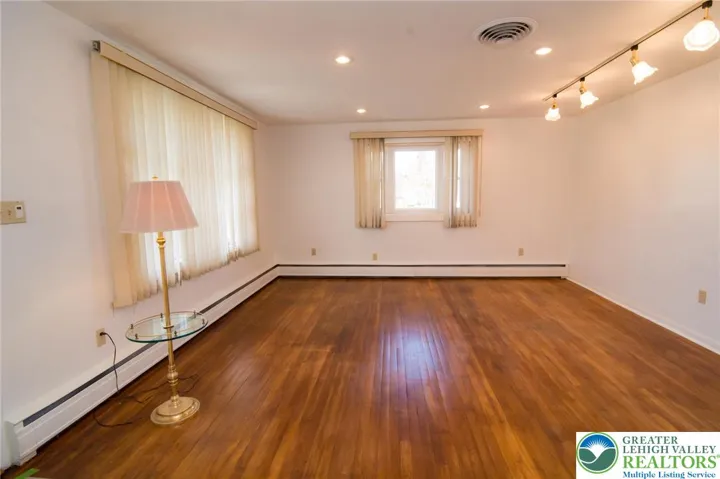 New carpeted bedroom with large closet