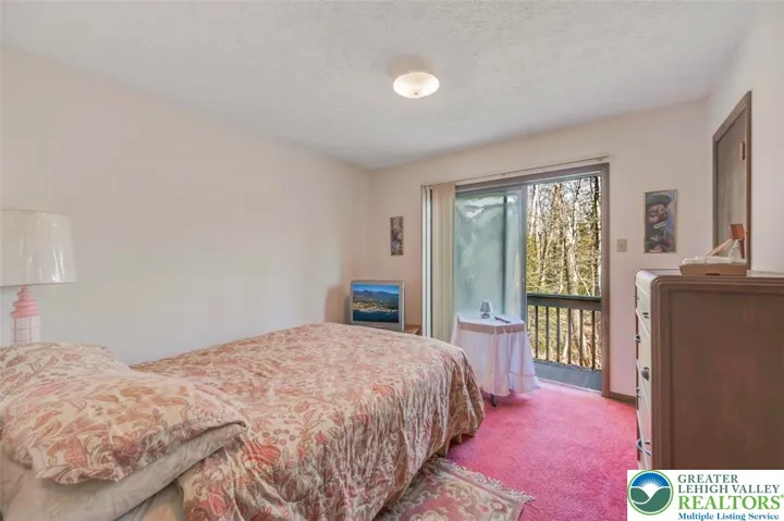 Bedroom 2 w/ Balcony