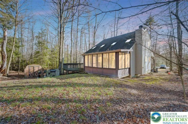 Rear 3 Season Room & Deck View