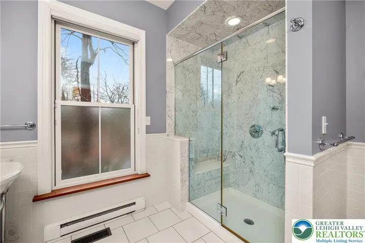 Large Marble Walk-In Shower w/ Bench
