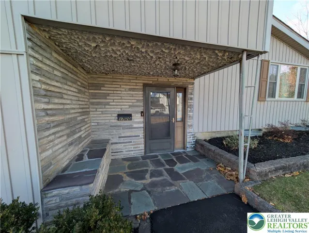 Front covered flagstone porch
