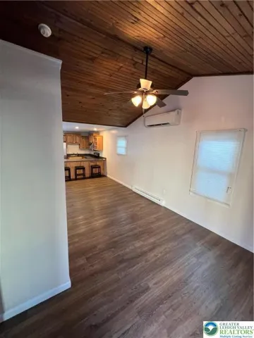 Enter the front door to the open concept living and kitchen areas