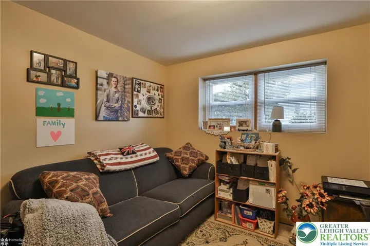 Lower-level den (possible 4th bedroom)