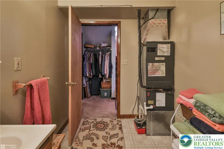 View from lower-level bath to hallway closet