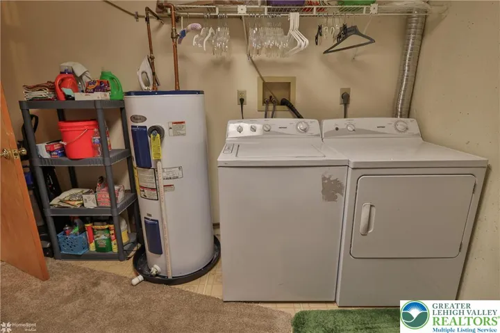 Lower-level laundry/utility room leading to garage