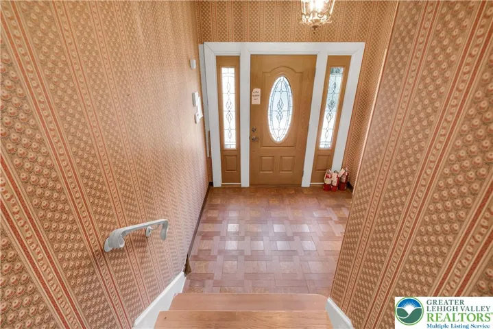 Foyer Leading to Back Door of House
