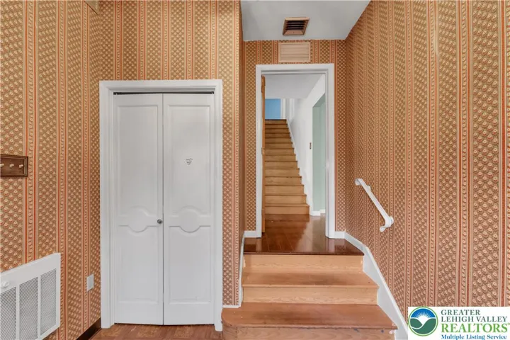 Foyer Leading to Back Door of House