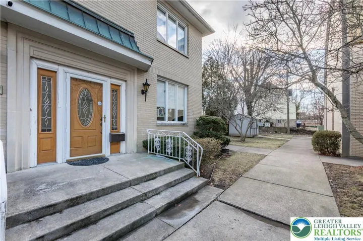 Entrance into House from Back / Vacant Lot